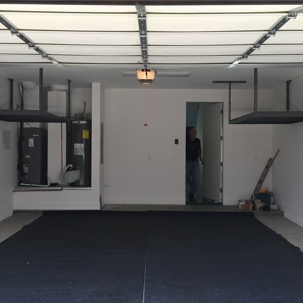 the interior of a clean and organized garage